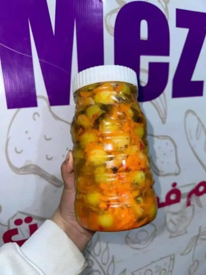 26. مخلل زيتون اخضر نص ك